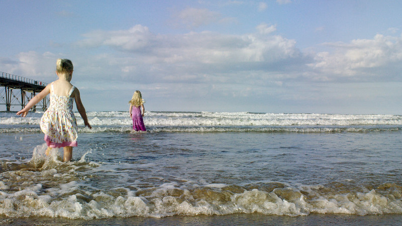 Girls enjoying a paddle at Saltburn Credit Fridge Productions (Limited)/NYMPA