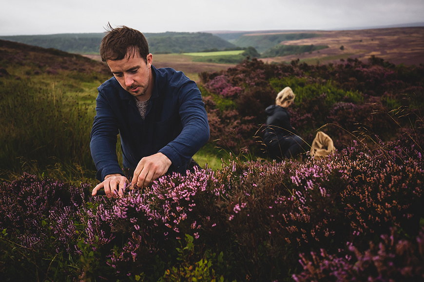 Luke and Jess collecting heather from the moorland by Ceri Oakes
