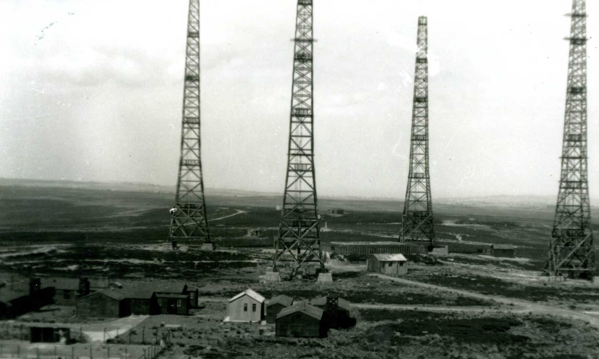 Four large metal structures among a moorland landscape. Four large metal structures among a moorland landscape.