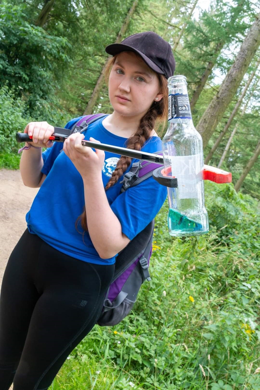 Young Ranger Livia collects litter in the NYM