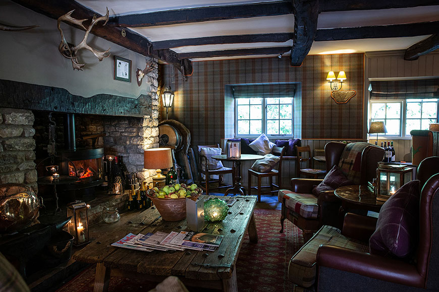 Sitting room with furniture and wood burner by Polly Baldwin Sitting room with furniture and wood burner by Polly Baldwin