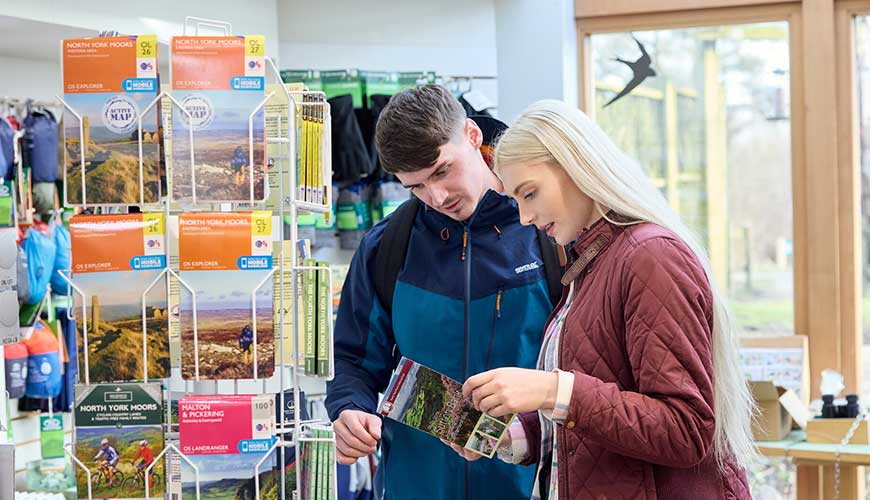 Man and woman shopping at Sutton Bank National Park Centre
