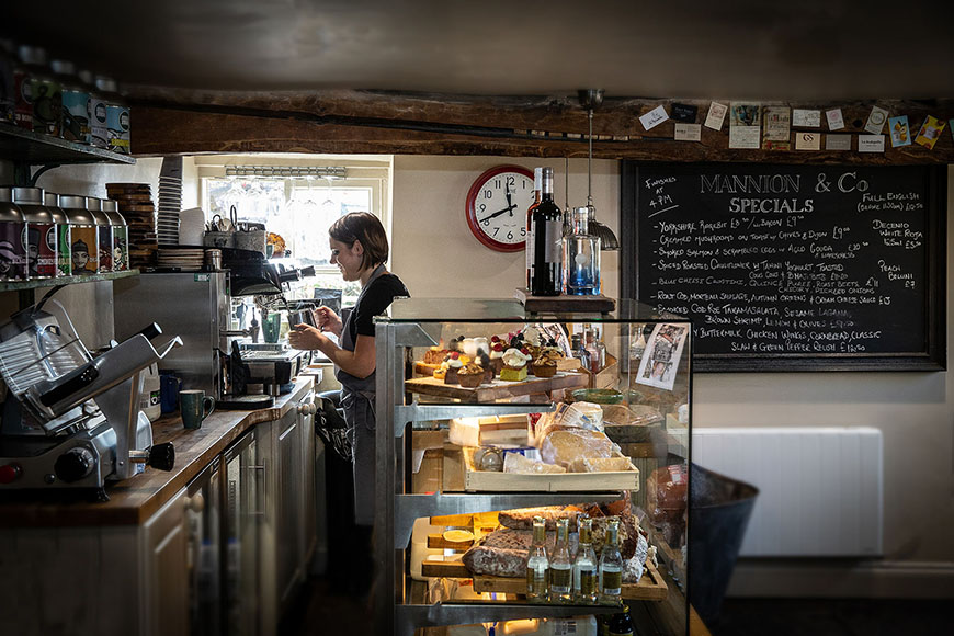 Coffee machine, cake counter and blackboard by Polly Baldwin