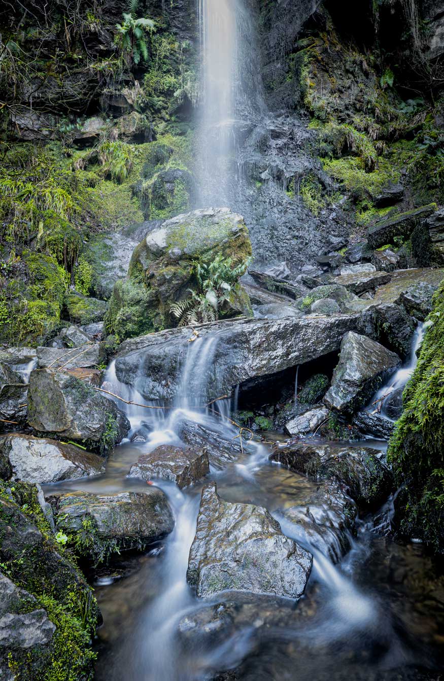 Close up of water falling onto rocks. Credit James Hines.