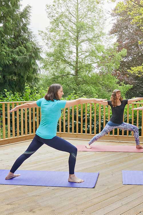 Yoga on the beach VisitBritain/Melody Thornton