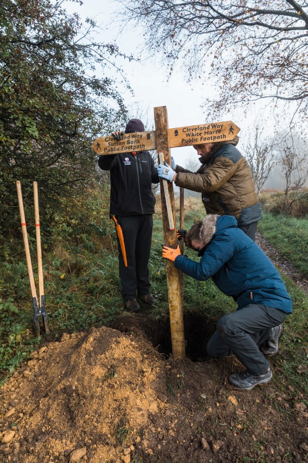 Team installing new waymarker post by Ben Read