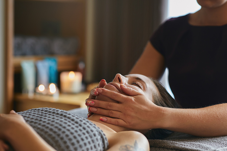A woman enjoying a spa treatment at The Feversham Arms
