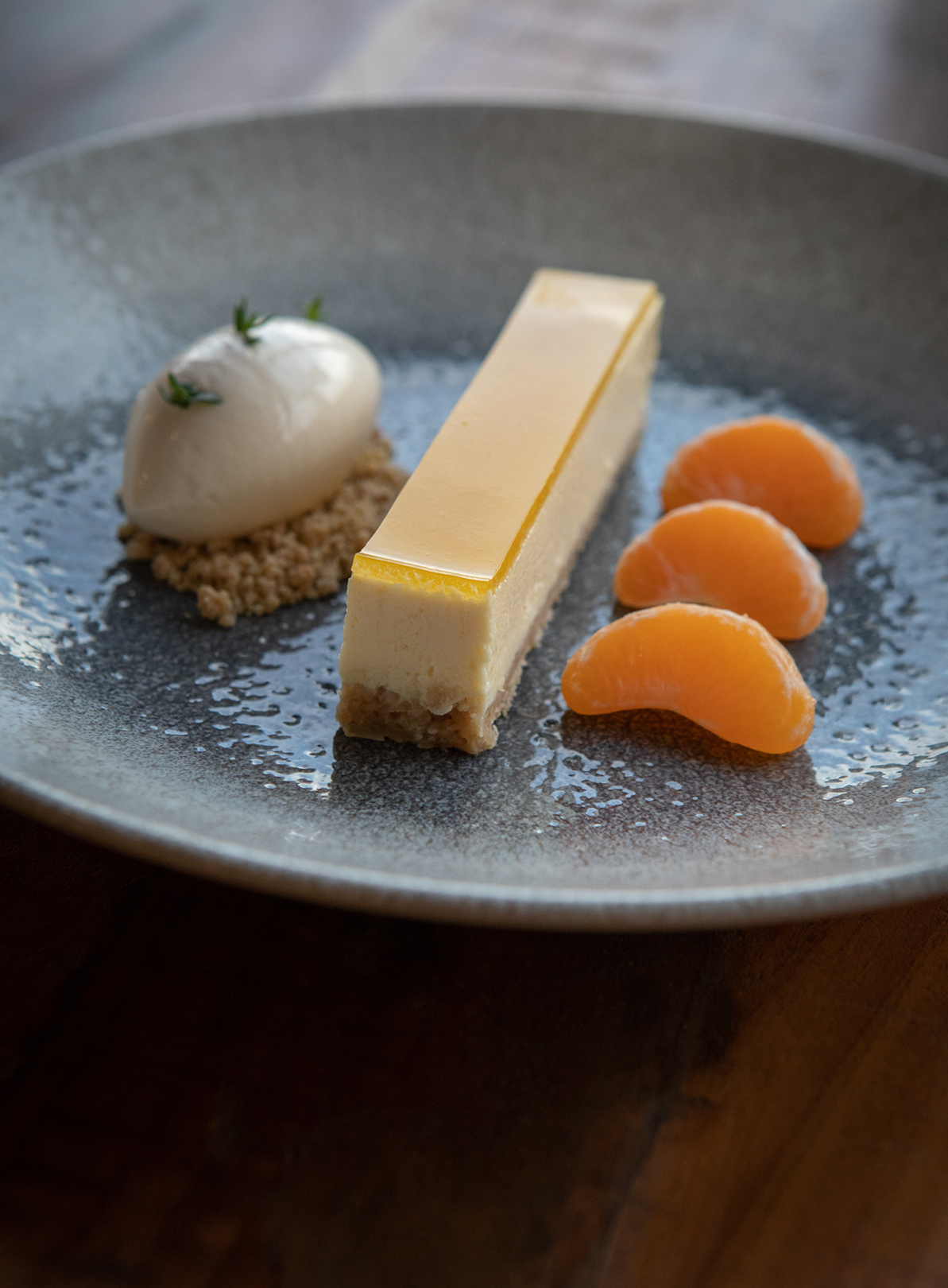 Clementine cheesecake with ice cream and orange segments by Polly Baldwin