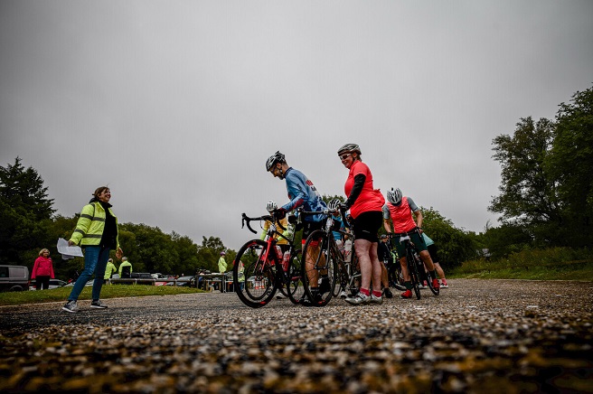 Cyclists at start of cycle event by Charlotte Graham Photography